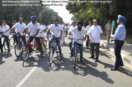 CHIEF GUEST SH TEJINDER SINGH LUTHRA FLAGGING OFF THE RALLY FROM UT GUEST HOUSE