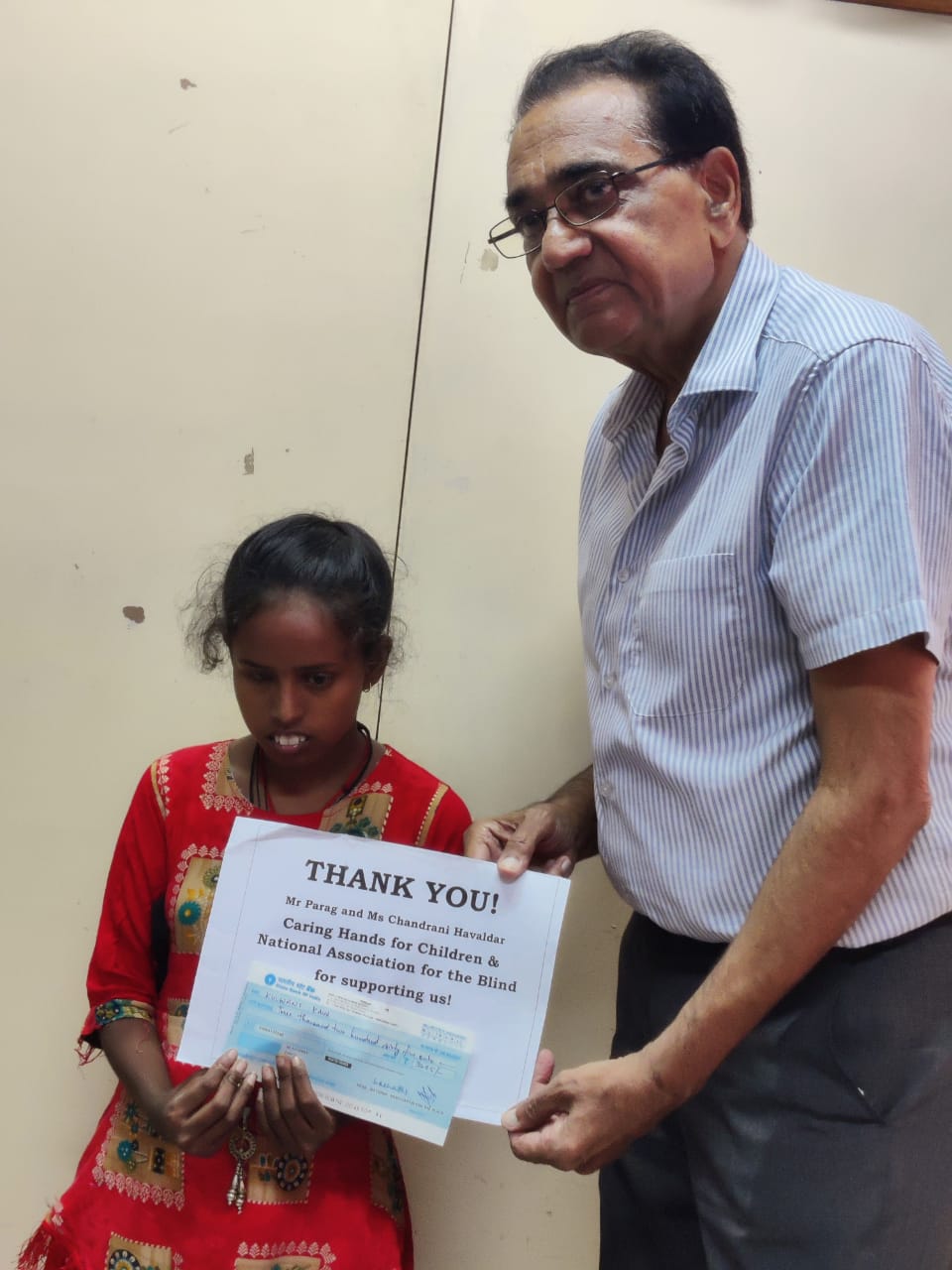 Scholarship distribution to visually challenged students